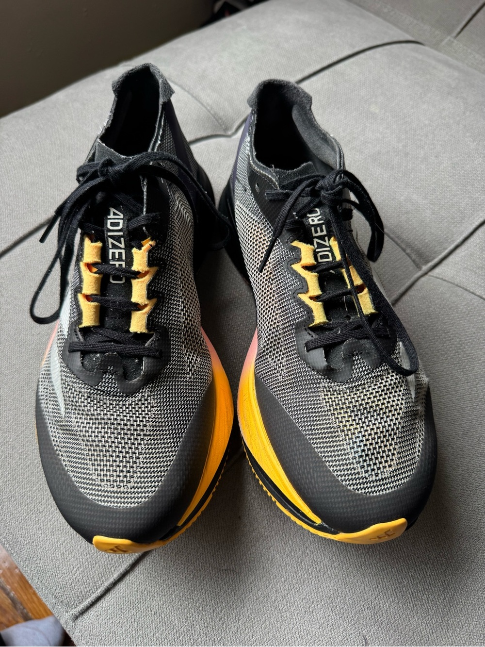 ADIZERO Racing Shoes in Black and Yellow